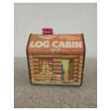 Log cabin syrup tin