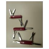 3 victorinox Swiss army knives