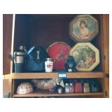 Contents of 2 shelves: tins, water bottles,