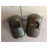Pair of welding helmets