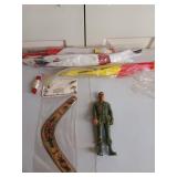 Three old kites, a boomerang, and a Marx brand