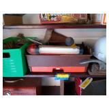 Contents of shelf, includes hard hat, drop l