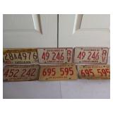 Assorted license plates from various States and