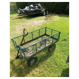 Green metal garden cart, 27x24x28 in, tires need