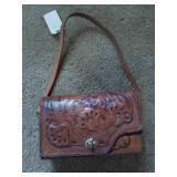 Tooled leather purse, strap needs re-sewn