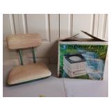 Stadium seat and passport potty in box