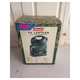 Coleman TV lantern with instant weather in box