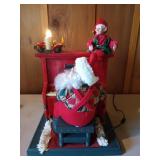 Illuminated Santa Claus piano player, has