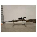 Knight 50 Cal Black powder rifle w/ leupold scope