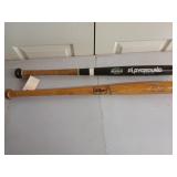 Set of two 30-in bats, one Wilson baseball bat,