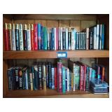 2 shelves of assorted books, CDs