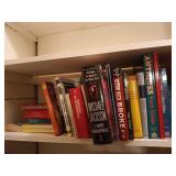 Closet contents: books, homemade dress, Oriental