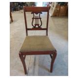 Old wooden chair w/ upholstered seat