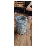 partial spool barbed wire  as pictured