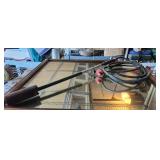 Propane bottle attaching flame thrower weed