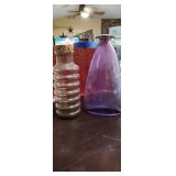2 large heavy glass jars one is 10" tall and one