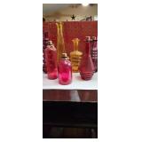 lot of fabulously shaped bottles in red, yellow