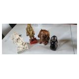4 collectible vintage or antique figures as