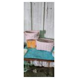 2 heavy pink woven baskets. these have been in