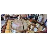 Sea full pendant lighting has glass bottom for