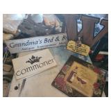 Random assortment of signs and wall decor g
