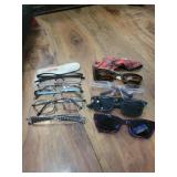 Lot of glasses and sunglasses with lenses cleaner
