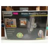 Shiatsu massaging cushion, works