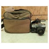 Antique Petri camera in bag