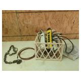 Plastic crate of power strips, appliance boards,