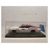 Classic stock car diecast collectible in display