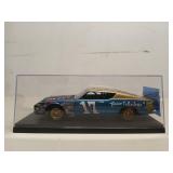 Classic stock car diecast collectible in display