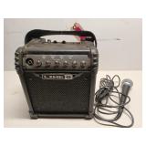 Line 6 portable amplifier with microphone, works