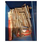 Tub of assorted taps