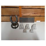 Horseshoe decor, metal sign stating on this site