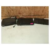 Two DVD players, no remotes, and one VHS player,