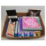 Box of three ring binders, spiral notebooks,