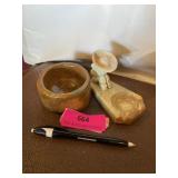 Stone carved ashtray and handmade pottery ashtray