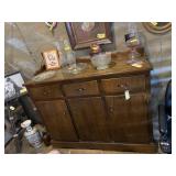 Wood cabinet with three drawers, three doors with