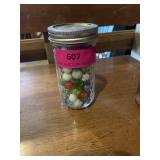 Ball jar 5 1/2 inch tall with assorted marbles