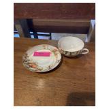 Nippon handpainted cup and saucer tiny chip on