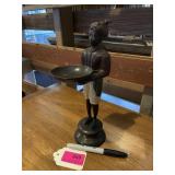 Bronze metal wear Nubian servant with coin tray