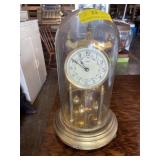 Brass and glass mantle clock