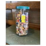 Big jar of cigars and  wrappers