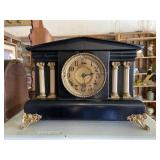 Very ornate antique mantle clock four columns,