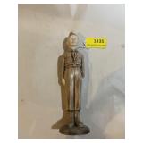 Ceramic figurine about 8 1/2 inches tall