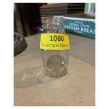 "Davol Feed Rite "  . 4 ounce glass baby bottle.