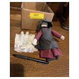 Vintage, Amish, doll and baby porcelain in quilt