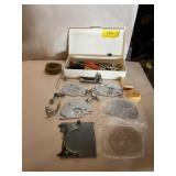 Sewing machine attachments in box