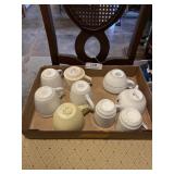 assortment of  antique coffee cups