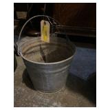 Vintage galvanized, bucket holes drilled in the